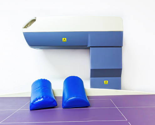 DEXA machine against white wall